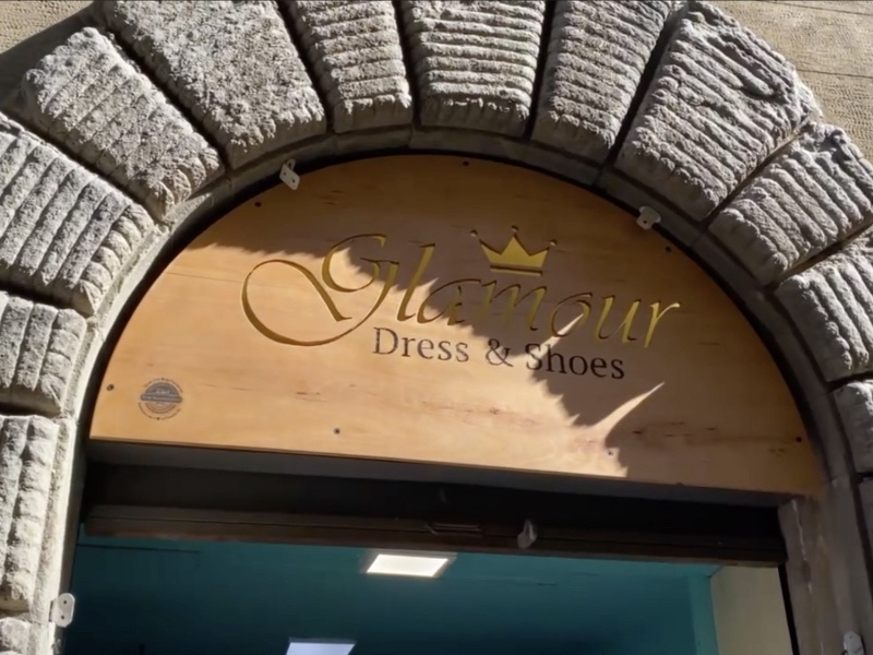 Beech shop sign made for Glamour Dress and Shoes, letters hand-cut so LED light shines through
